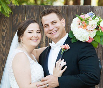 Emily Vest and husband on their wedding day